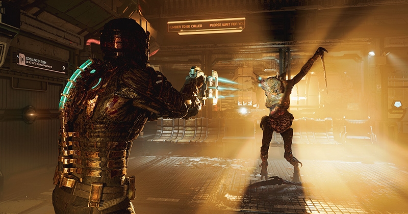 A still from gameplay of the Dead Space remake as Player character Isaac fires at in incoming necromorph